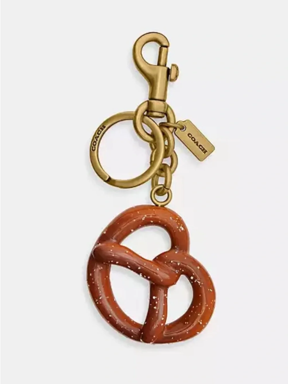 HOT!!!!  Coach Gold-Tone Pretzel Purse Charm in Brown.  NWT and Dusty